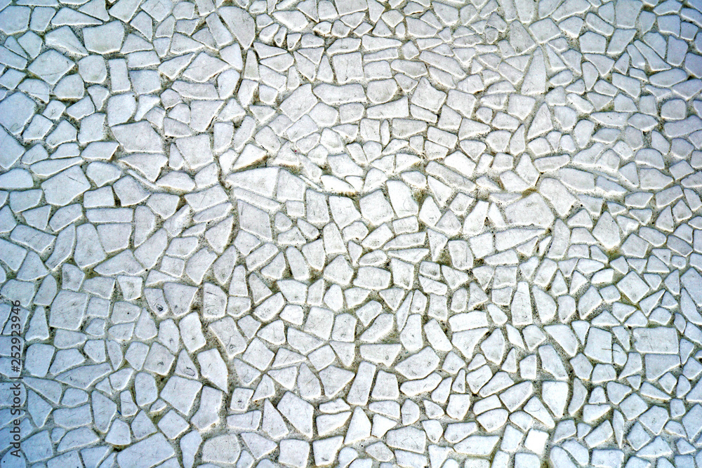 effect created by the structure of a wall of pieces of white marble effect created by the structure of a wall of pieces of white marble