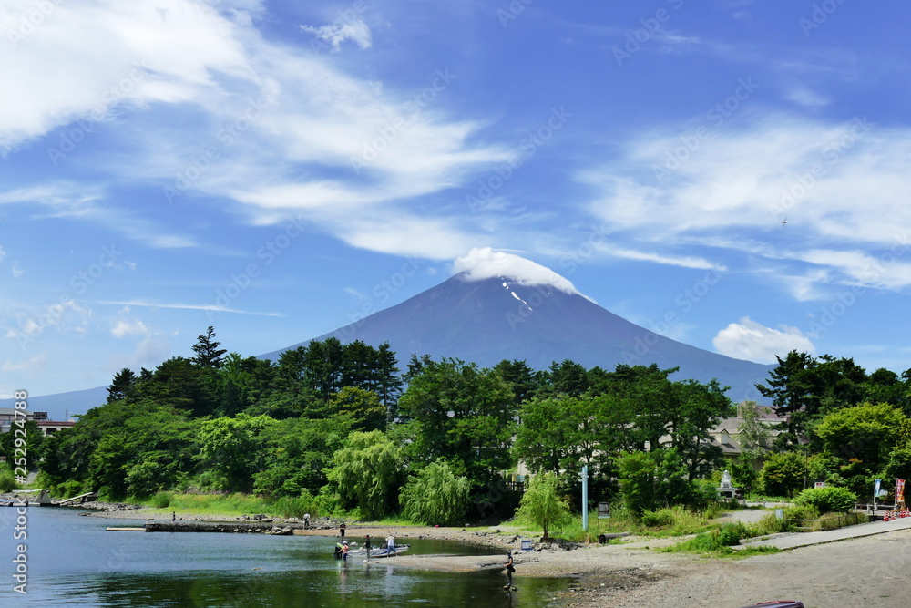 Naklejka premium Mount Fuji capped with a cloud seen from Kawaguchiko, Japan