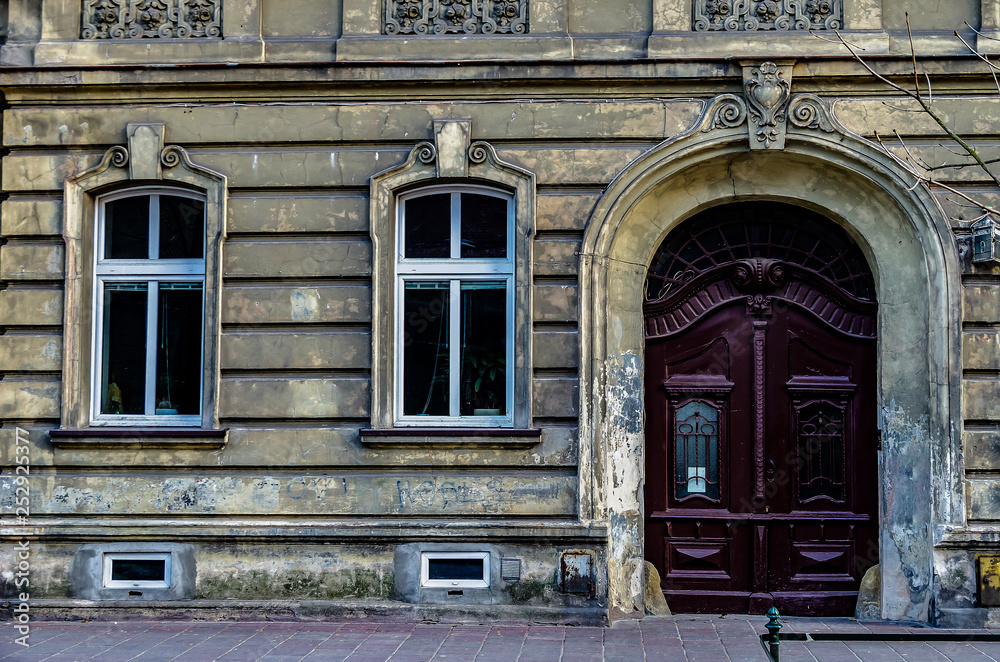 Beautiful double carved wooden front doors.