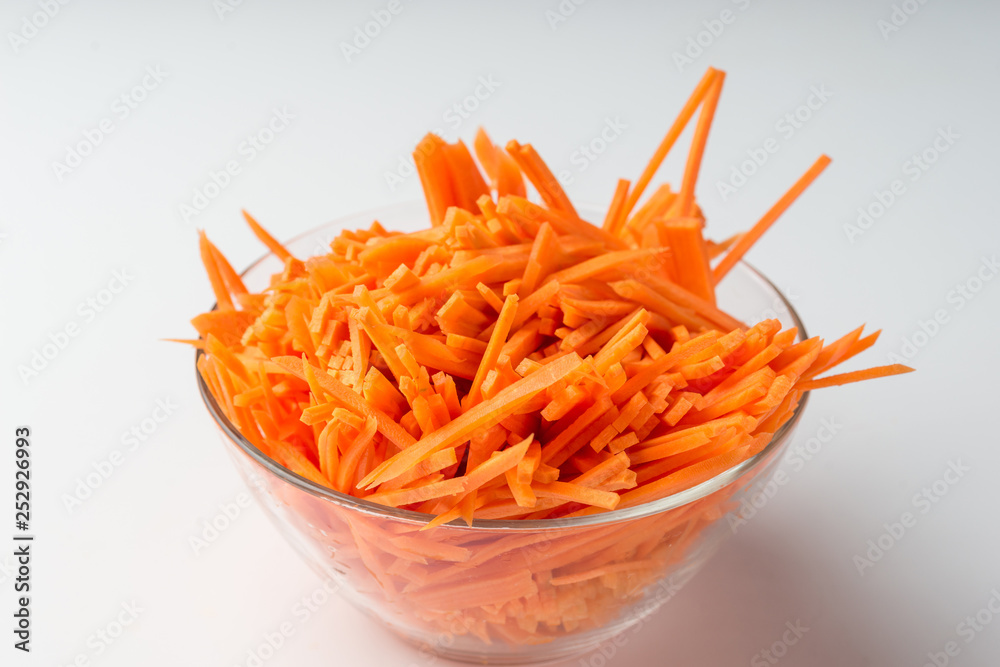 Sliced carrots Carrots background. Carrot sliced into pieces. Carrot straws. Sliced carrots Carrots background. Carrot sliced into pieces. Carrot straws.