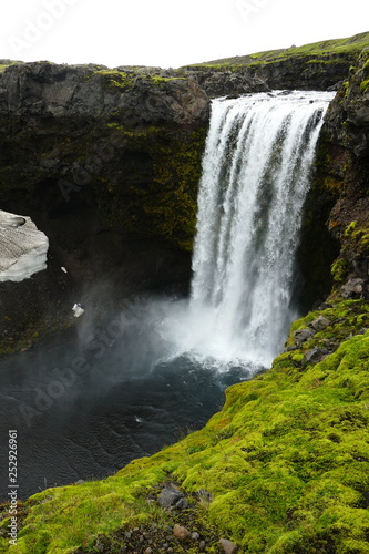 Waterfall in the fog on waterfall trail  first stage of Fimmv  rduhals mountain pass  Iceland