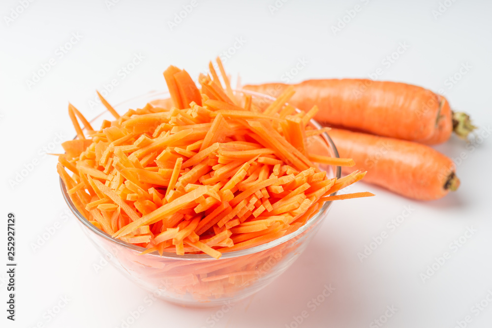 Sliced carrots Carrots background. Carrot sliced into pieces. Carrot straws. Sliced carrots Carrots background. Carrot sliced into pieces. Carrot straws.