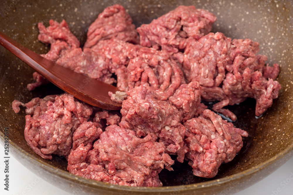 Minced meat on frying pan Minced meat on frying pan