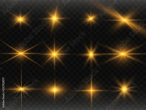 Set of gold bright beautiful stars. Light effect Bright Star. Beautiful light for illustration. Christmas star. White sparks sparkle with a special light. Vector sparkles on transparent background