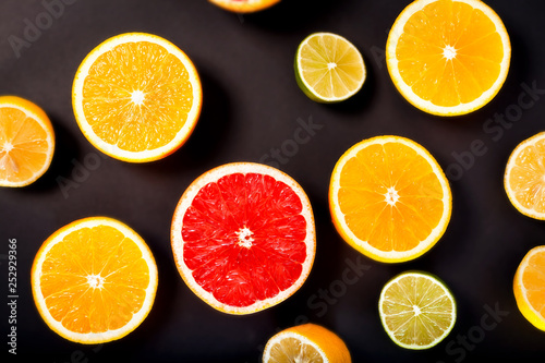 Different fruits in a cut on a black background