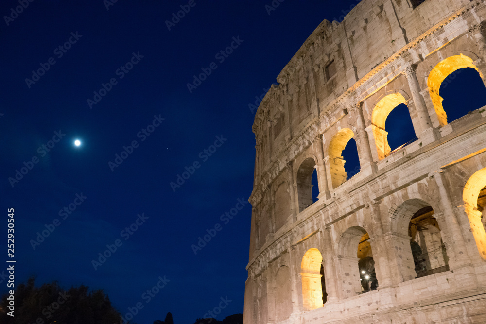 Night at the Great Roman Colosseum (Coliseum, Colosseo), also known as the Flavian Amphitheatre with lights & illumination.