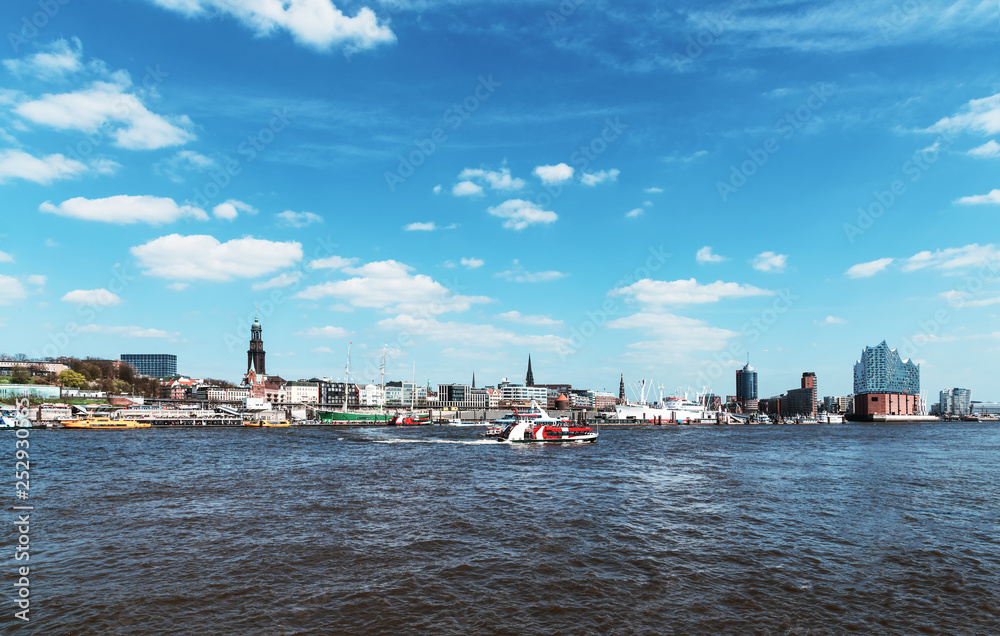 harbor and waterfront in Hamburg, Germany, against blue sky