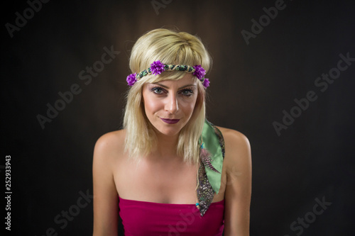 portrait of beautiful young woman wearing hippie headband