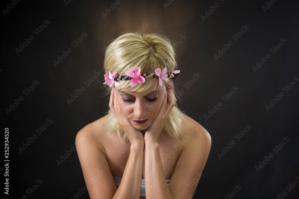 Naklejka premium portrait of beautiful young woman wearing hippie headband