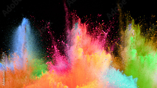Slika na platnu Multi-color powder explosion on black background
