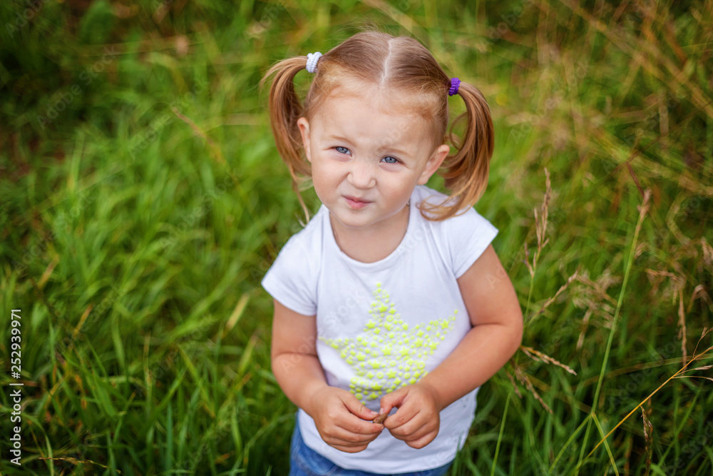 Portrait of happy cute little girl outdoor. Kid palying in park, garden, fairy forest. Happiness. Healthy preschool children summer activity Portrait of happy cute little girl outdoor. Kid palying in park, garden, fairy forest. Happiness. Healthy preschool children summer activity