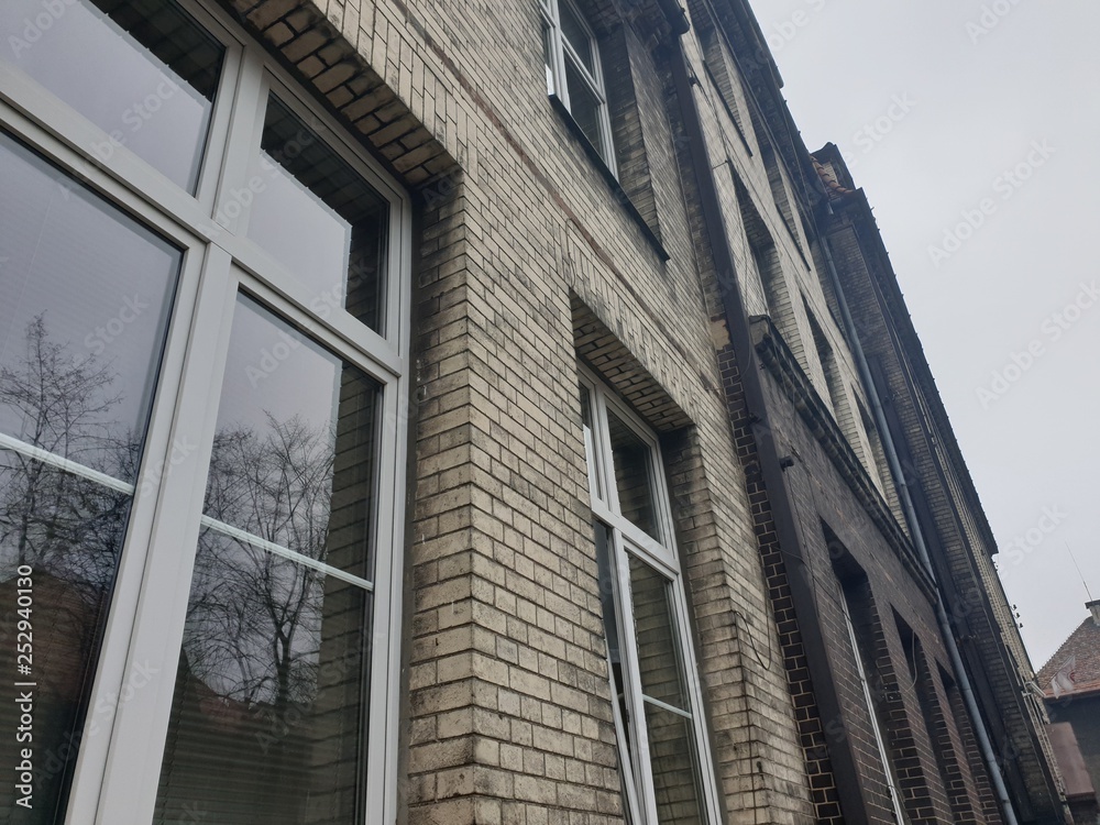 custom made wallpaper toronto digitalBeautiful stone house with mirrored glass on a background of blue spring sky, the old architectural city