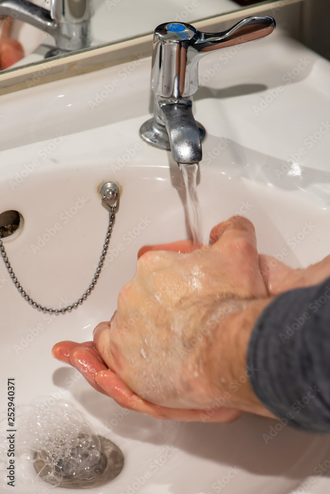 Fototapeta premium washing hand with soap