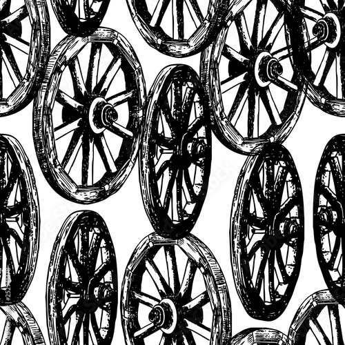 Seamless background of old wooden wheels