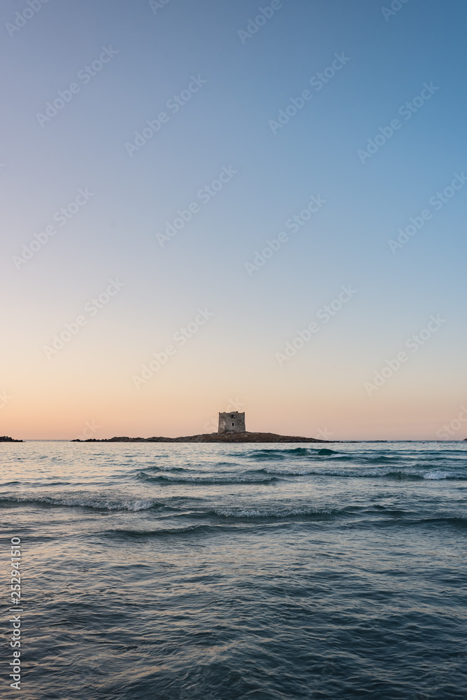 Torre sul mare al tramonto, Sardegna