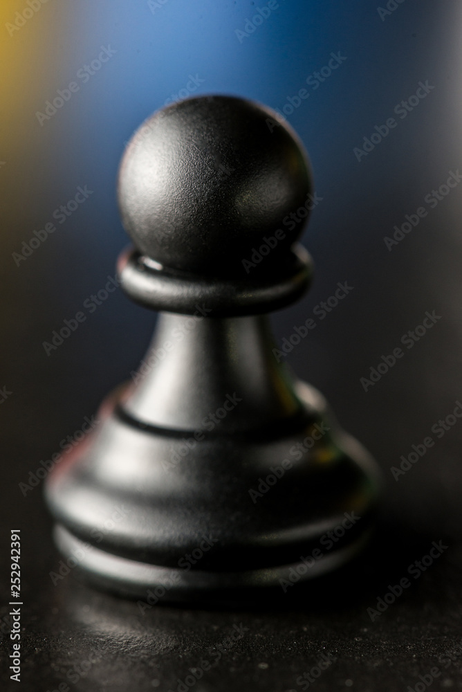 chess black pawn close-up on a blurred background chess black pawn close-up on a blurred background