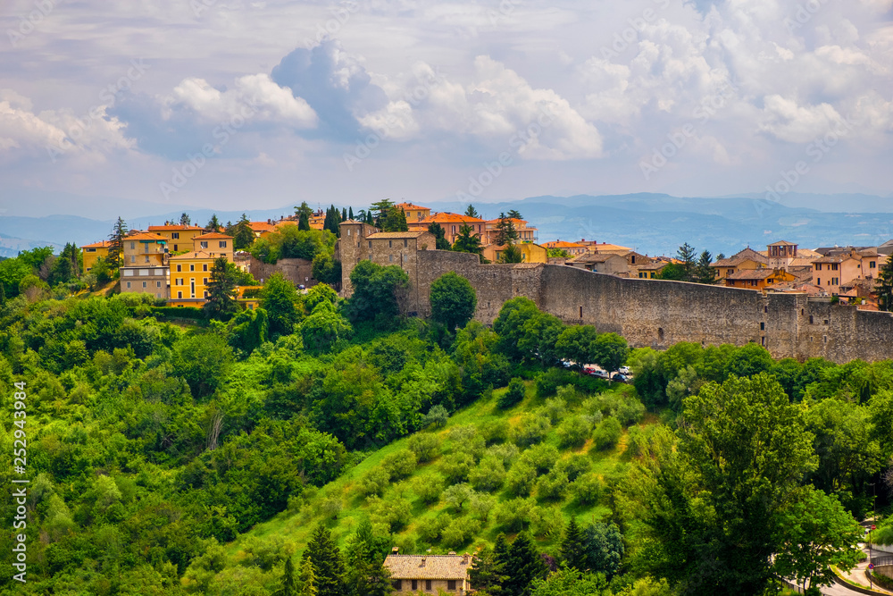 Perugia, Italy - Panoramic view of the Perugia historic quarter with medieval houses and defense walls and surrounding Umbria region valleys