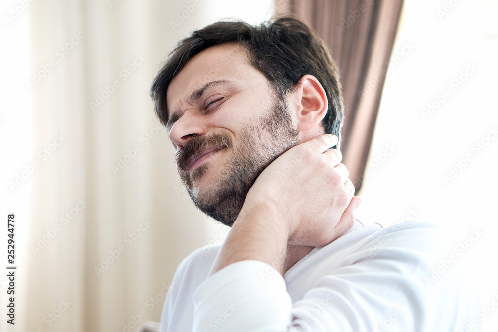 Obraz premium Young man with neck pain