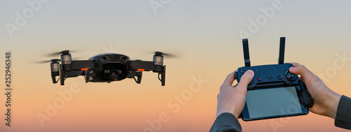 Drone in the sky with remote controller