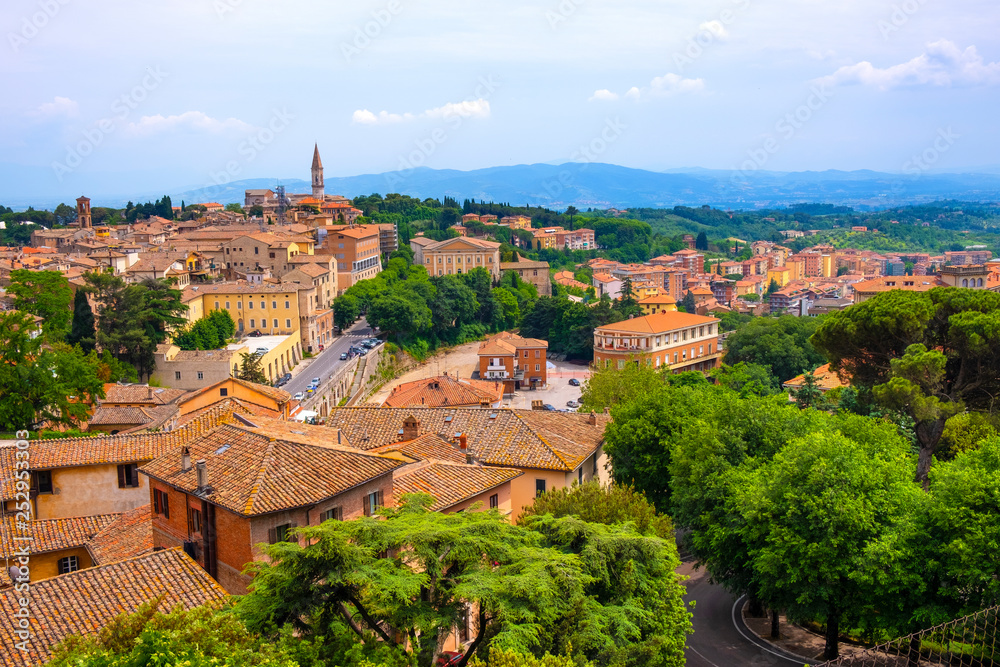 Perugia, Italy - Panoramic view of Perugia and Umbria region mountains and hills with St. Peter Church and Abbey - Cattedrale e Abazia di San Pietro