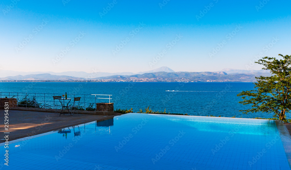 outdoor swimming pool with beautiful sea views