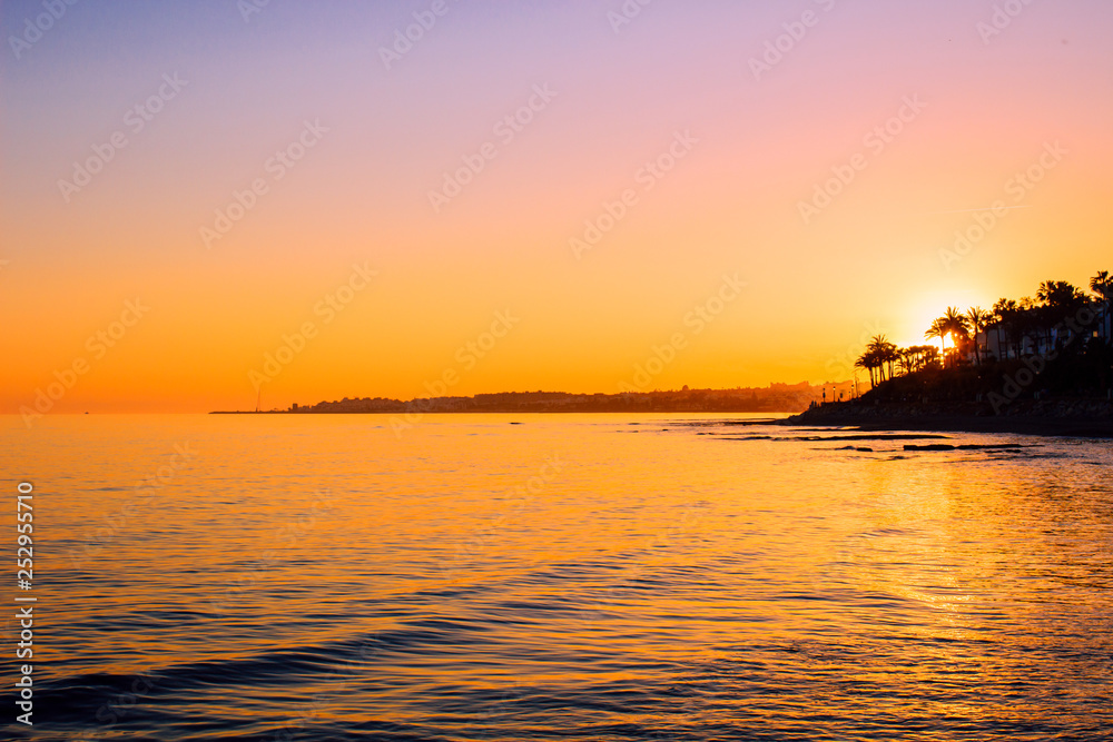 Sunset landscape. View of Puerto Banus, Marbella.