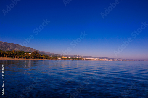 Beach. View of the evening beach of Marbella. Costa del Sol, Andalusia, Spain. Picture taken – 3 March 2019.