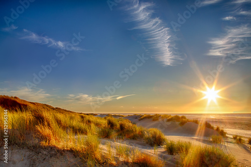 Sunset at the beach on the East Frisian Island Juist in the North Sea, Germany.