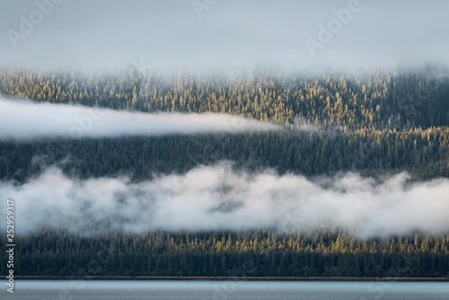 Fog hanging on the mountains in the Inside Passage; Alaska