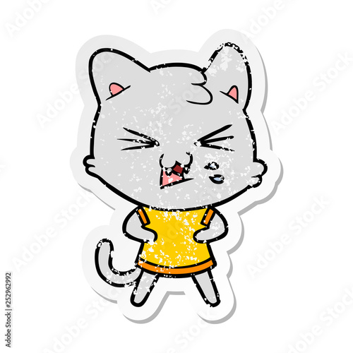 distressed sticker of a cartoon hissing cat