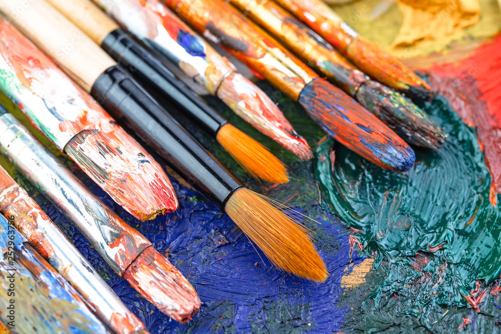 Fototapeta premium Paint brushes and paints for drawing.