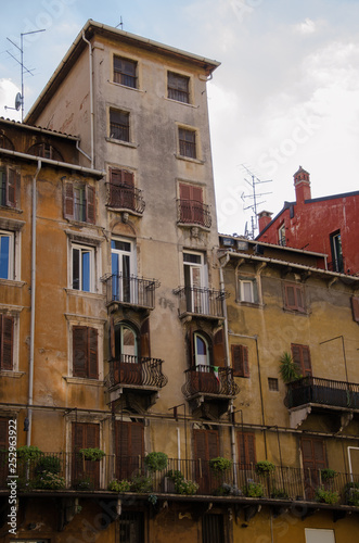 Beautiful old and historic building with hand forged balconies in Verona, Italy