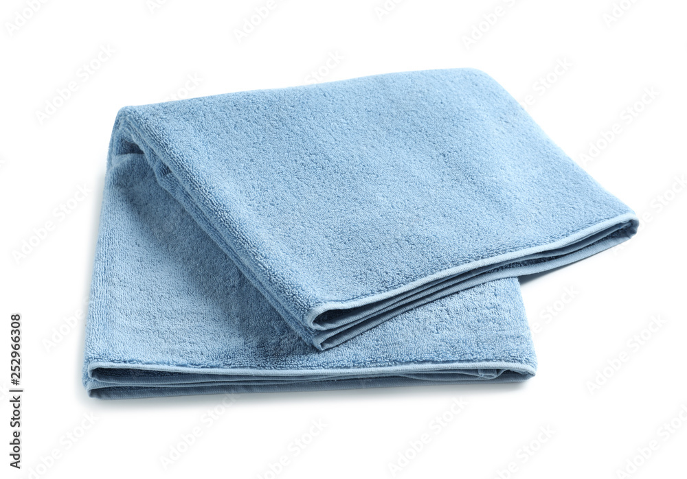 Fresh soft folded towel isolated on white Fresh soft folded towel isolated on white