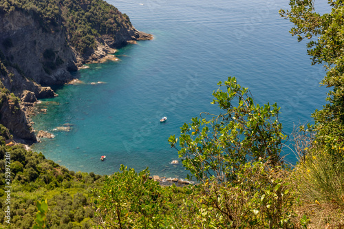 Italy, Cinque Terre, Corniglia, a large body of water surrounded by trees