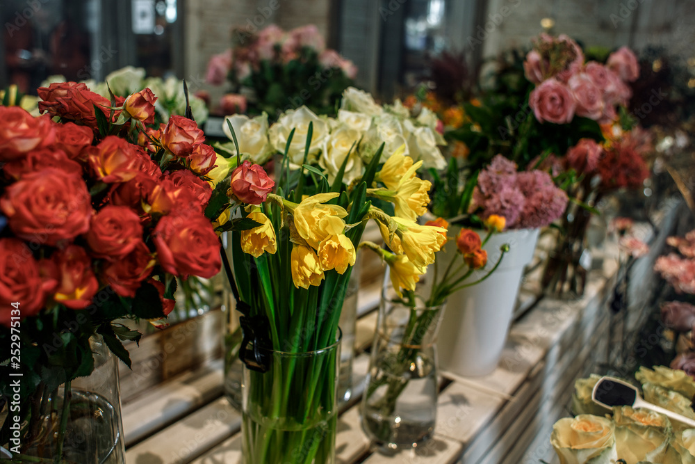  Flower's business.  Lifestyle flower shop. Beautiful flower composition. Detail. Close up. Flower's background.