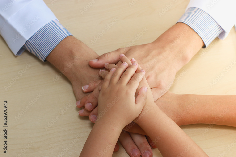 Closeup of a small group of doctors, patients, children and families. Closeup of a small group of doctors, patients, children and families.