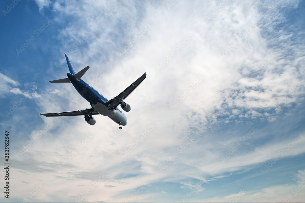 Airplane over the clouds,