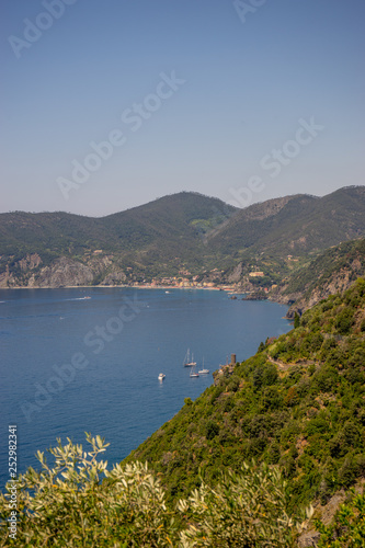 Fototapeta Naklejka Na Ścianę i Meble -  Italy, Cinque Terre, Corniglia, a large body of water with a mountain in the background