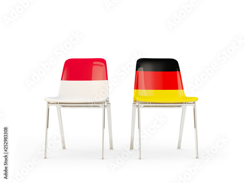 Two chairs with flags of Indonesia and germany