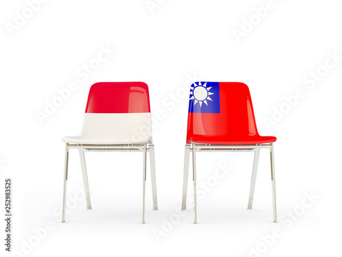 Two chairs with flags of Indonesia and taiwan