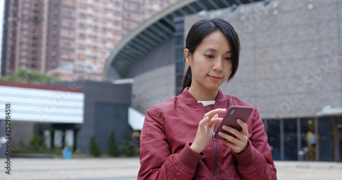 Photography Woman use of mobile phone at outdoor