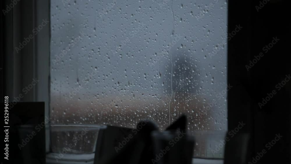 Rain water on Window- window - rain - close up - droplets - glass - weather - storm