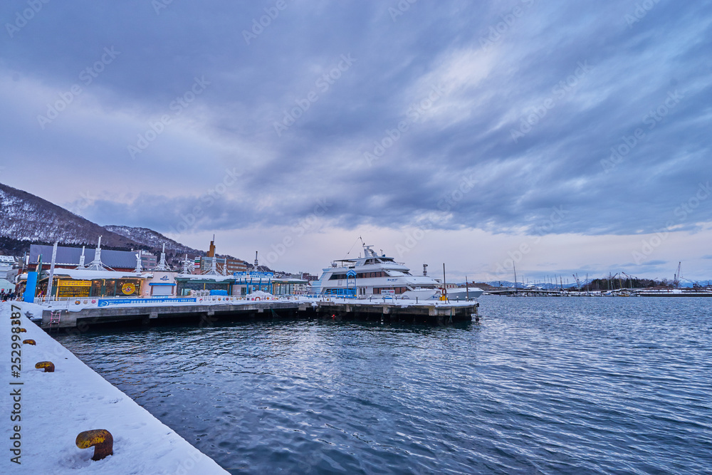 Fototapeta premium Port around Kanemori Red Brick Warehouse in winter season at Hakodate city, Hokkaido, Japan.