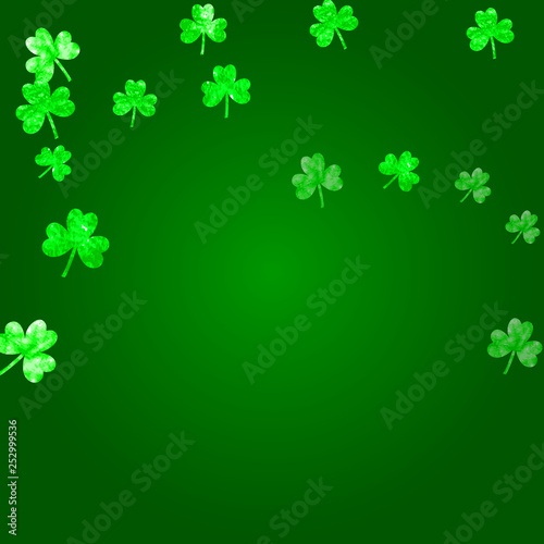 Saint patricks day background with shamrock. Lucky trefoil confetti. Glitter frame of clover leaves. Template for party invite, retail offer and ad. Festive saint patricks day backdrop.