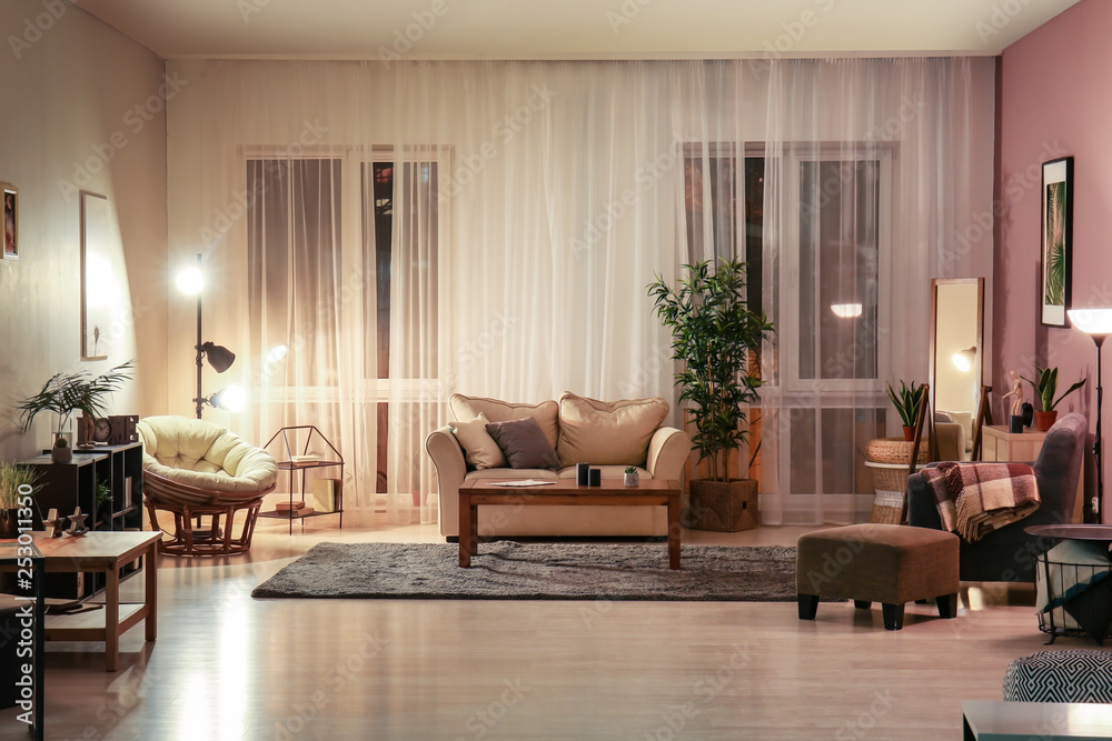 Interior of modern apartment in evening