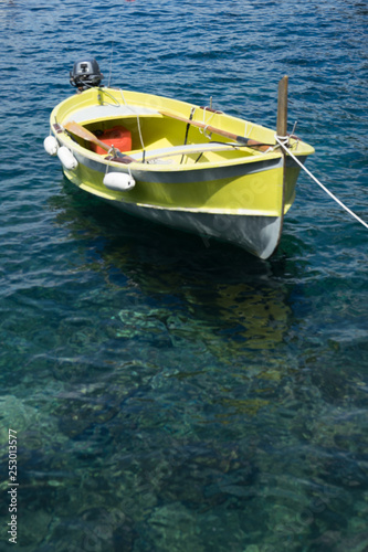 Italy, Cinque Terre, Manarola, a small boat in a body of water