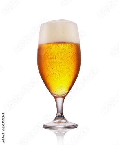Cold Craft light Beer in a glass with water drops. Glass of beer isolated on white background