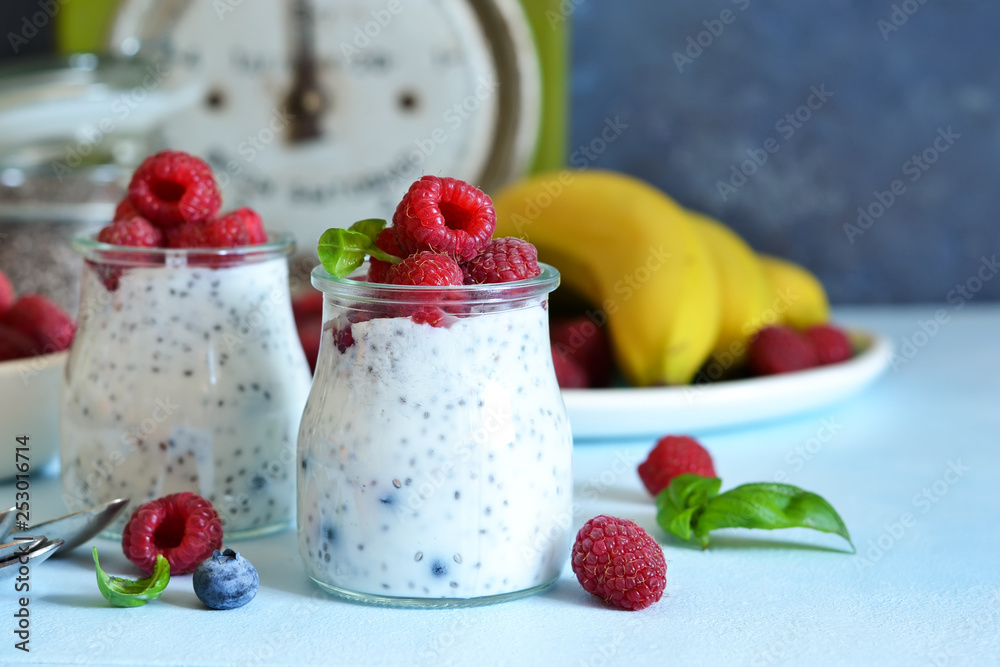 Vanilla yoghurt with raspberries and banana for breakfast. Dietary meals. Vanilla yoghurt with raspberries and banana for breakfast. Dietary meals.