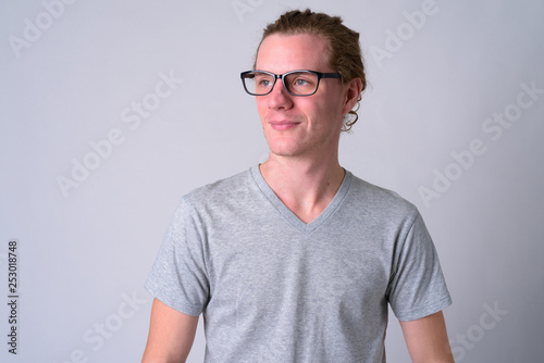 Face of young handsome man with eyeglasses thinking © Ranta Images