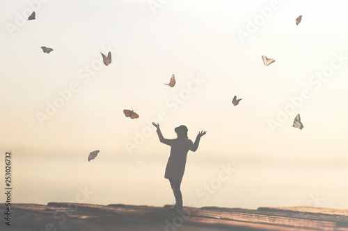 woman dancing with butterflies welcoming spring